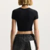 Camiseta de bebé de canalé con aplique del logotipo