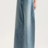 Pantalón holgado con logotipo brillante