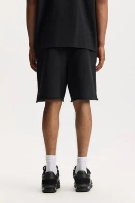 Pantalones cortos con letras de lentejuelas