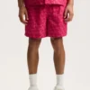 Pantalones cortos con monograma de cubos