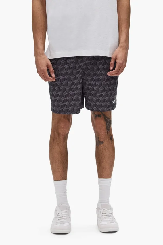 Pantalones cortos con monograma de cubos en todo el contorno