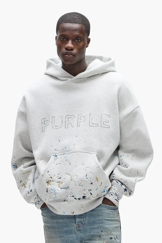 Sudadera con capucha de camuflaje con tachuelas